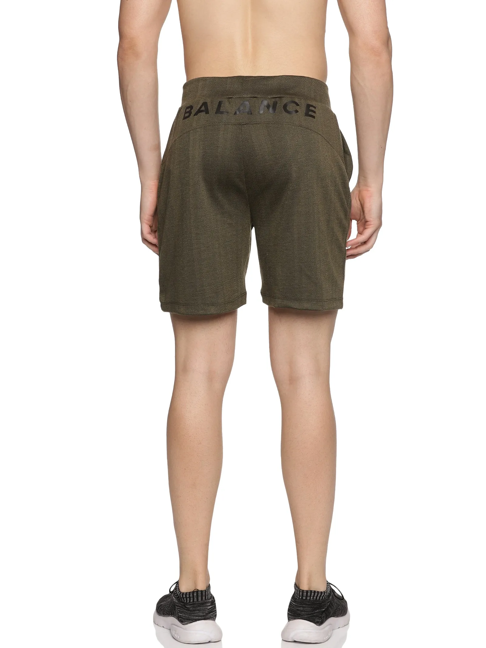 Men's solid Training Shorts with Side pockets & Elasticated waistband with Drawstring.